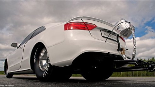 Illustration for article titled Watch an Audi A5 transform into a drag car